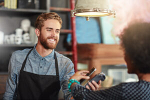 Front desk review QR code sign at a salon, restaurant, or spa encouraging customers to share feedback